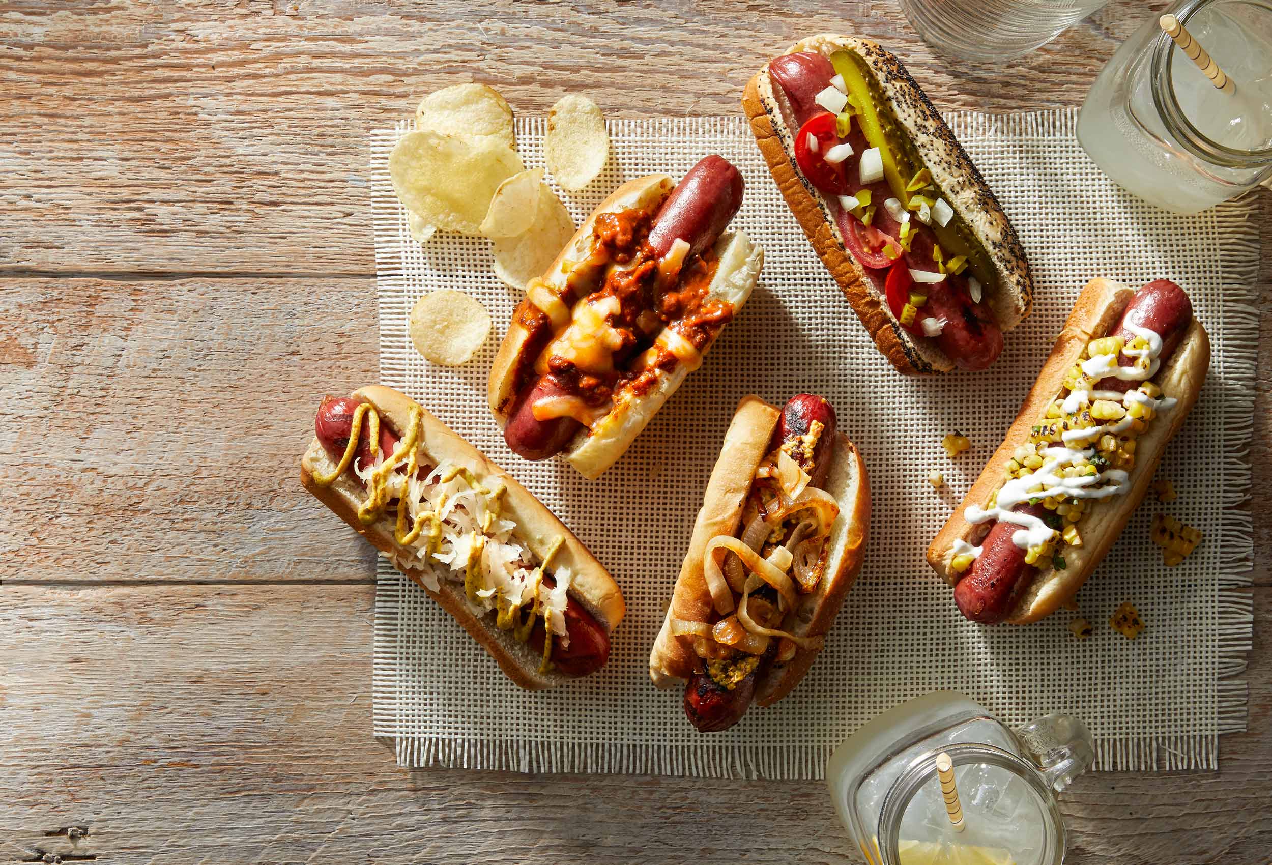 Summer hotdogs on a picnic table